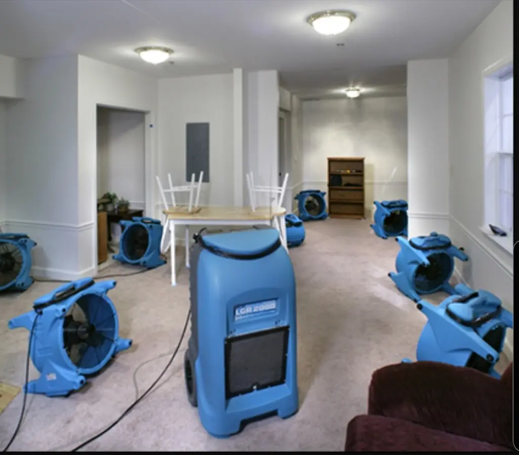 Air movers and dehumidifier setup for Water Damage Restoration in Hollymead